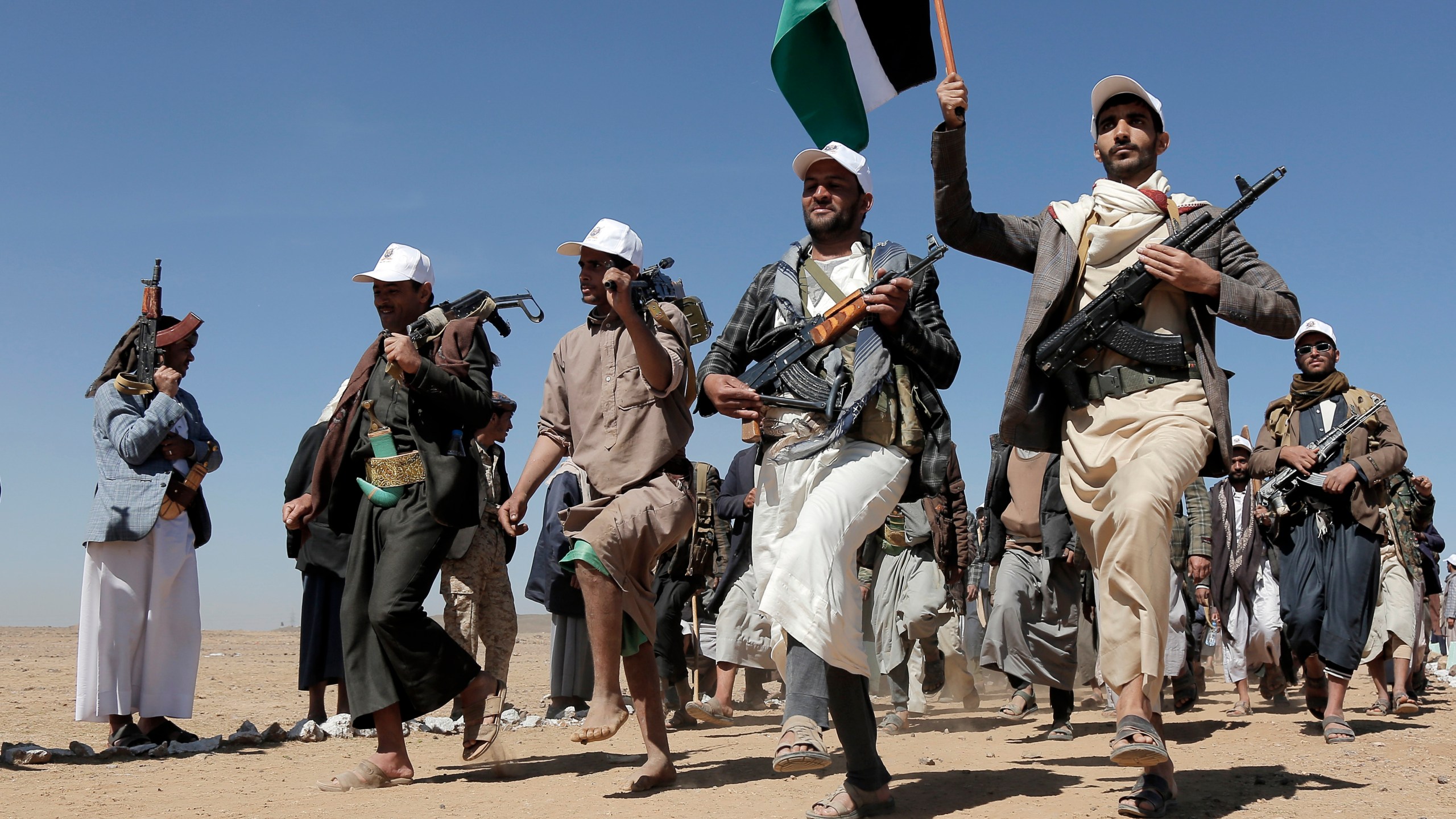 File - Houthi rebel fighters march during a rally of support for the Palestinians in the Gaza Strip and against the U.S. strikes on Yemen outside Sanaa on Jan. 22, 2024. (AP Photo, File)