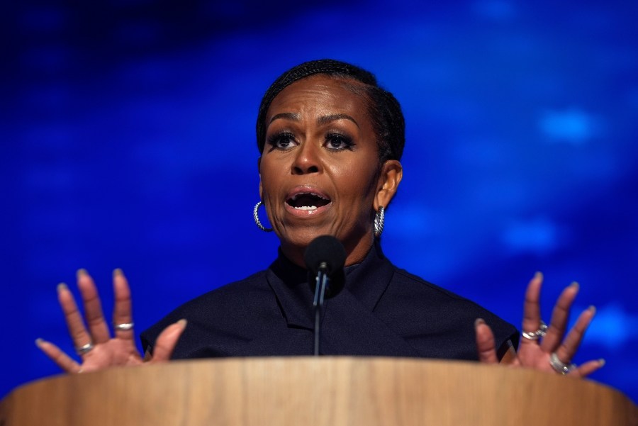 FILE - Former first lady Michelle Obama speaks during the Democratic National Convention Aug. 20, 2024, in Chicago. (AP Photo/Erin Hooley, File)