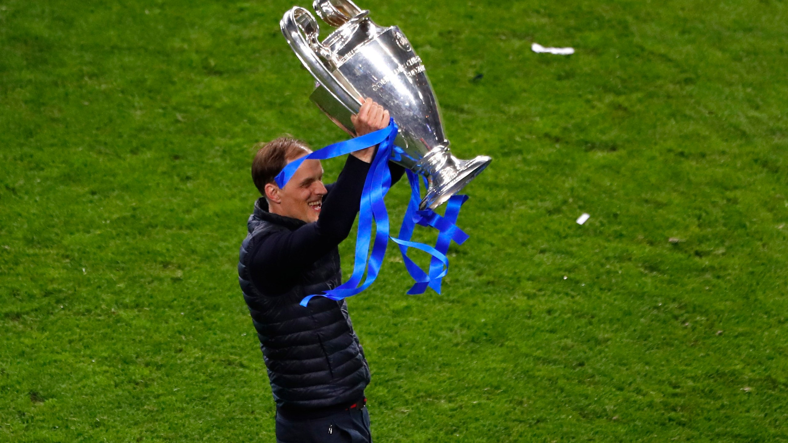 FILE - Chelsea's head coach Thomas Tuchel celebrates with the trophy after winning the Champions League final soccer match against Manchester City at the Dragao Stadium in Porto, Portugal, Saturday, May 29, 2021. (Susana Vera/Pool via AP, File)