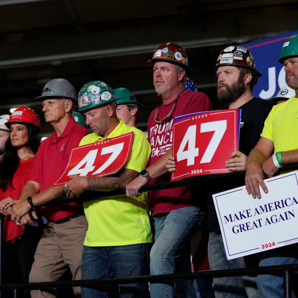 FILE - People arrive before Republican presidential nominee former President Donald Trump speaks at a campaign event, Sept. 27, 2024 in Walker, Mich. (AP Photo/Carlos Osorio, File)