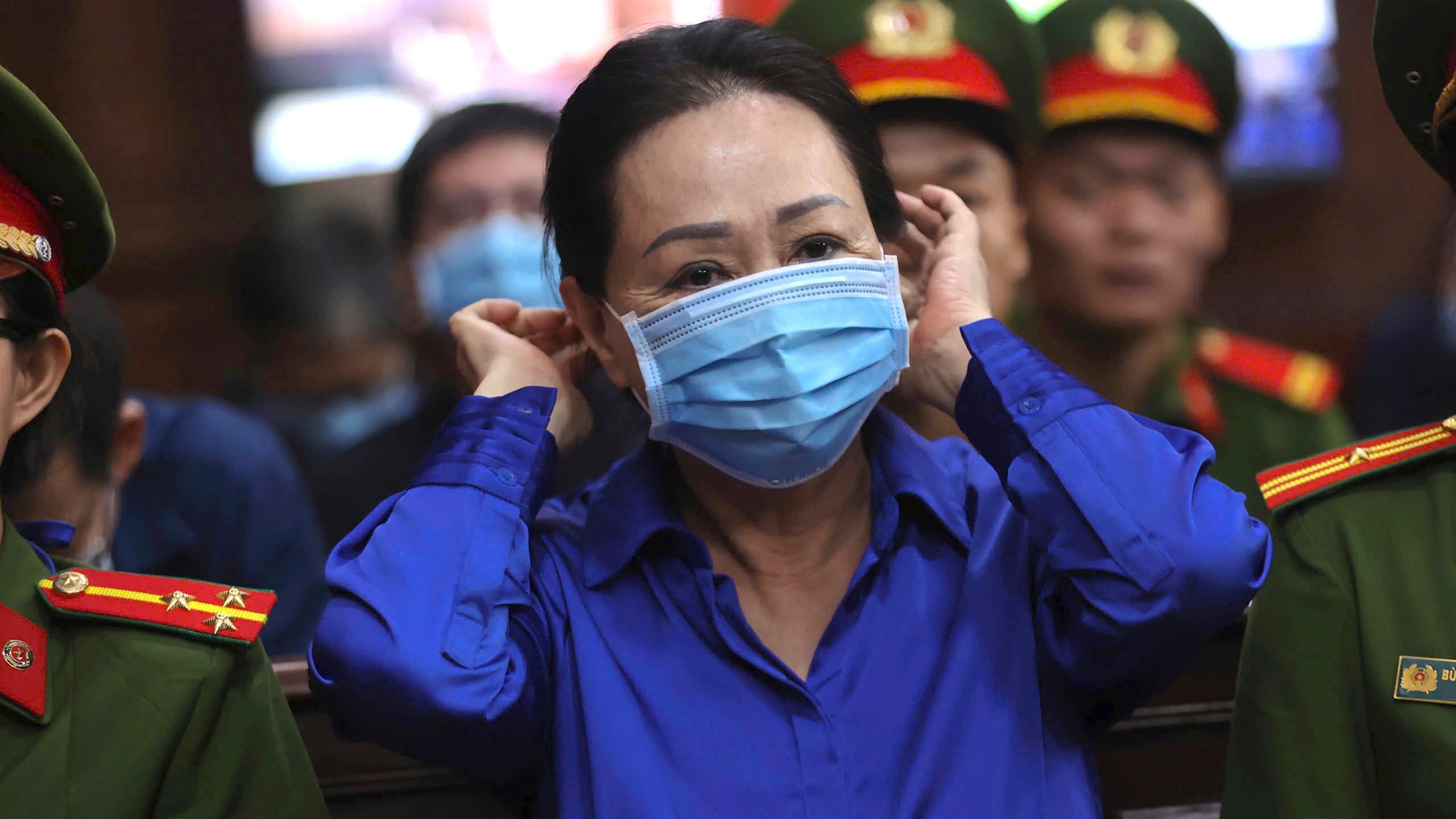 Vietnamese real estate tycoon Truong My Lan sits in court to wait for her verdict on fraud, money laundering and illegal cross-border money transferring in Ho Chi Minh city, Vietnam Thursday, Oct. 17, 2024. (Quynh Tran/VnExpress via AP)