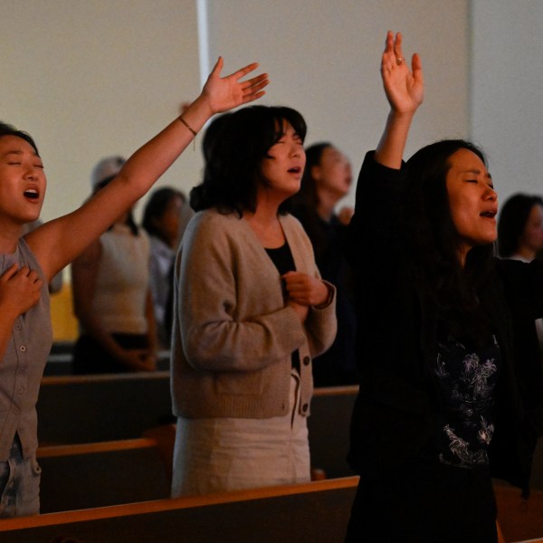 Parishioners pray during a service at the Christ Central Presbyterian Church, Sunday, Oct. 13, 2024 in Centreville. (AP Photo/John McDonnell)