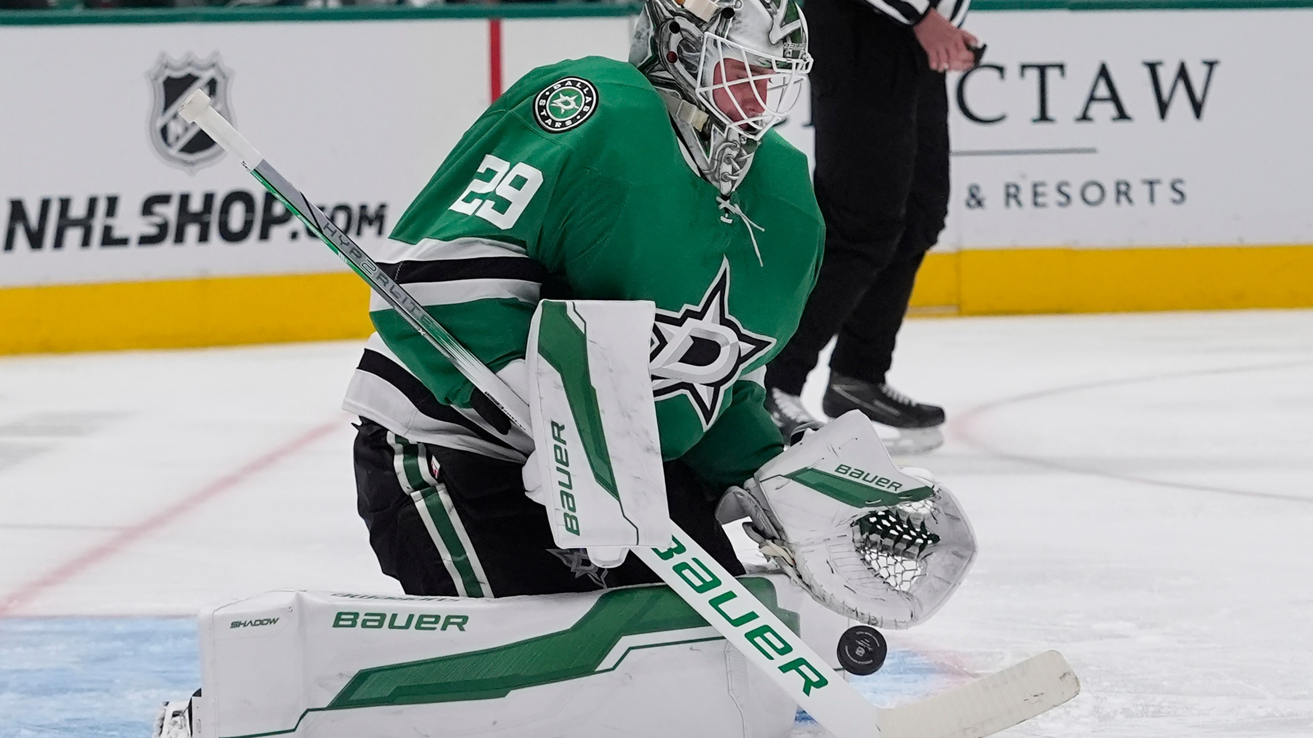 Dallas Stars goaltender Jake Oettinger (29) defends the goal during the second period of an an NHL hockey game against the San Jose Sharks Tuesday, Oct. 15, 2024, in Dallas. (AP Photo/LM Otero)