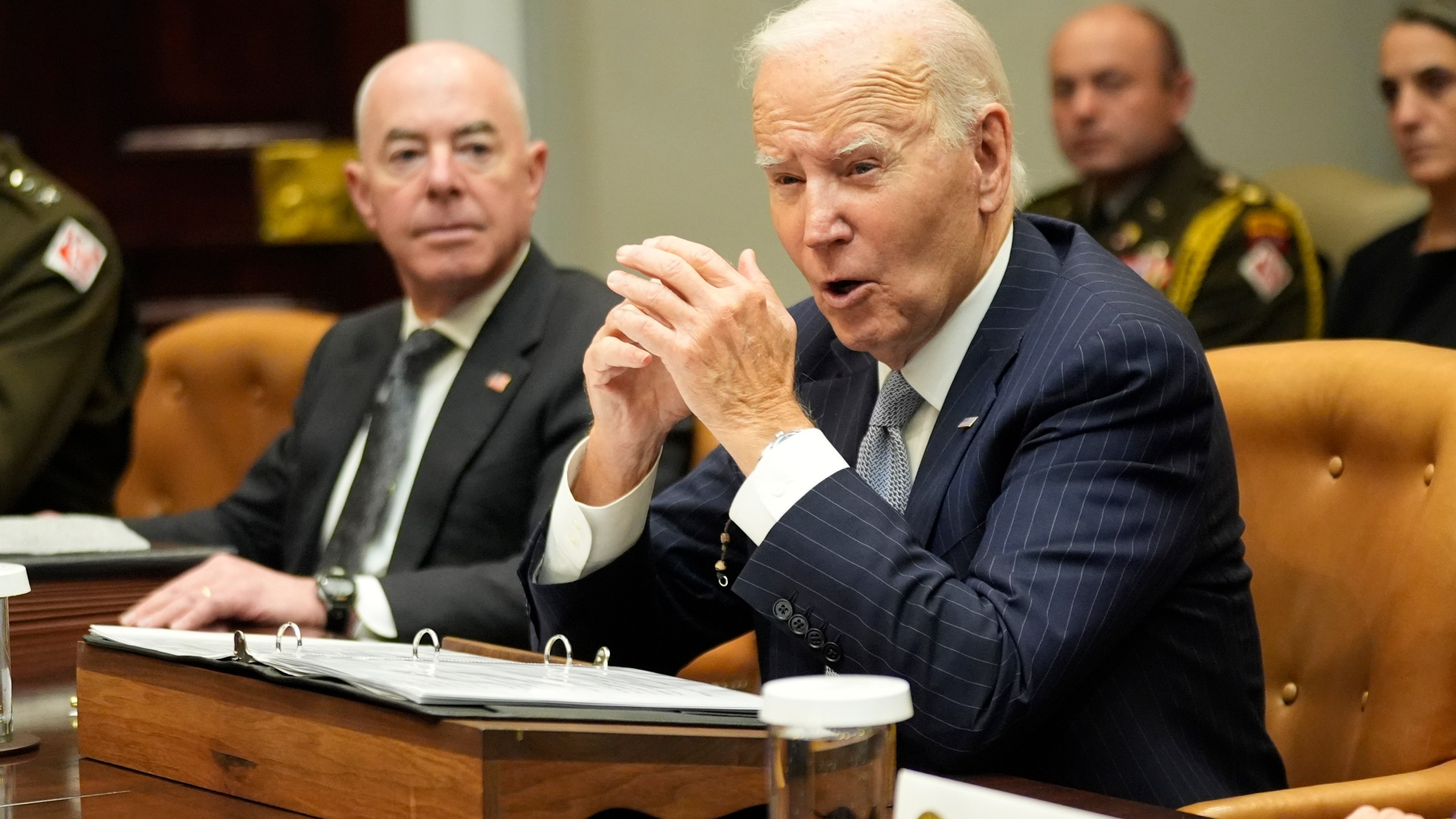 President Joe Biden speaks about the federal government's response to Hurricanes Milton and Helene as Homeland Security Secretary Alejandro Mayorkas listens, in the Roosevelt Room of the White House, Friday, Oct. 11, 2024, in Washington. (AP Photo/Manuel Balce Ceneta)