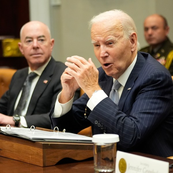 President Joe Biden speaks about the federal government's response to Hurricanes Milton and Helene as Homeland Security Secretary Alejandro Mayorkas listens, in the Roosevelt Room of the White House, Friday, Oct. 11, 2024, in Washington. (AP Photo/Manuel Balce Ceneta)