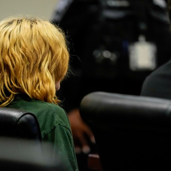 FILE - Colt Gray, charged as an adult with four counts of murder, sits in the Barrow County courthouse during his first appearance for the shooting at Apalachee High School, Sept. 6, 2024, in Winder, Ga. (AP Photo/Brynn Anderson, Pool, File)