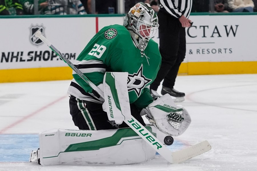 Dallas Stars goaltender Jake Oettinger (29) defends the goal during the second period of an an NHL hockey game against the San Jose Sharks Tuesday, Oct. 15, 2024, in Dallas. (AP Photo/LM Otero)