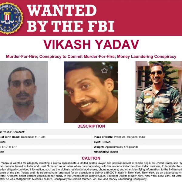 This wanted poster provided by the FBI shows Vikash Yadav, an Indian government employee, wanted on criminal charges in connection with a foiled plot to kill a U.S. citizen in New York City. (FBI via AP)