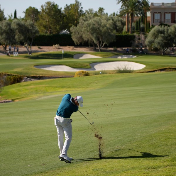 Ben Silverman hits on the third hole during the first round of Shriners Children's Open golf tournament Thursday, Oct. 17, 2024, in Las Vegas. (AP Photo/John Locher)