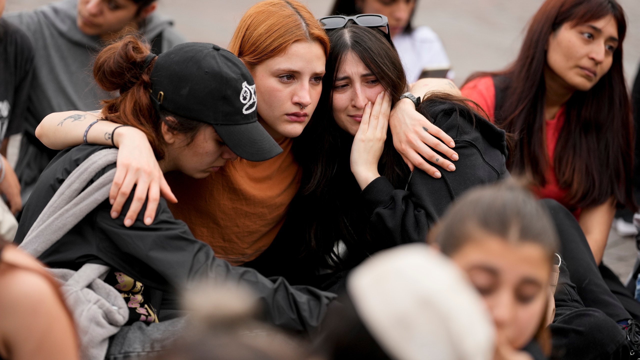 Fans of former One Direction singer Liam Payne gather at the Obelisk to honor him one day after he was found dead at a hotel in Buenos Aires, Argentina, Thursday, Oct. 17, 2024. (AP Photo/Natacha Pisarenko)