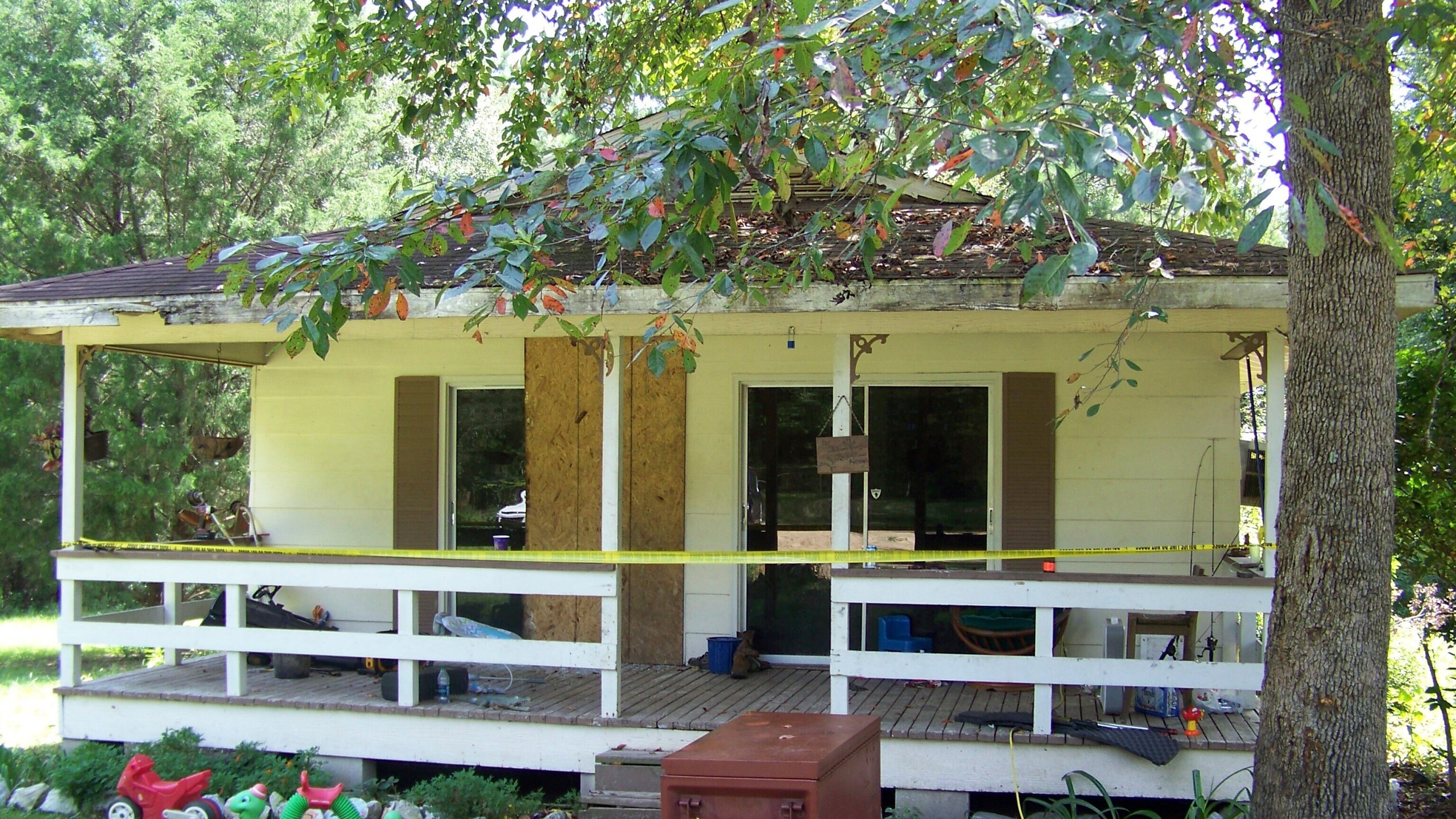 FILE - Crime scene tape marks the home on Jim Platt Road near Citronelle, Ala., Sunday, Aug. 21, 2016, where authorities said five people were killed. (John Sharp/Press-Register via AP, File)