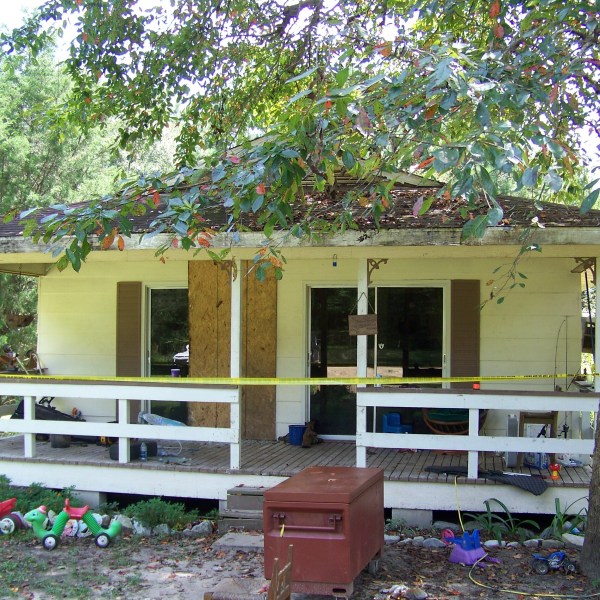 FILE - Crime scene tape marks the home on Jim Platt Road near Citronelle, Ala., Sunday, Aug. 21, 2016, where authorities said five people were killed. (John Sharp/Press-Register via AP, File)