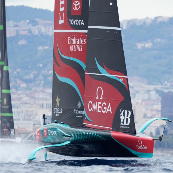 Ineos Britannia and Emirates Team New Zealand race during Louis Vuitton 37th America's Cup Day 5 race 8 in Barcelona, Spain, Friday, Oct. 18, 2024. (AP Photo/Bernat Armangue)