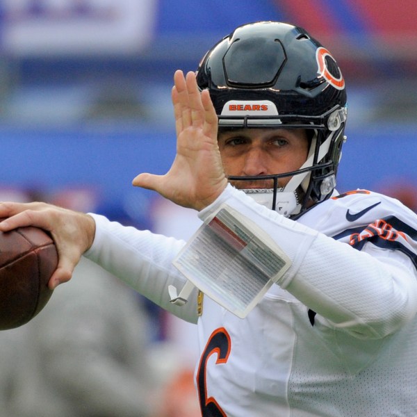 FILE - Chicago Bears quarterback Jay Cutler (6) warms up before playing against the New York Giants in an NFL football game in East Rutherford, N.J., Nov. 20, 2016. (AP Photo/Bill Kostroun, File)