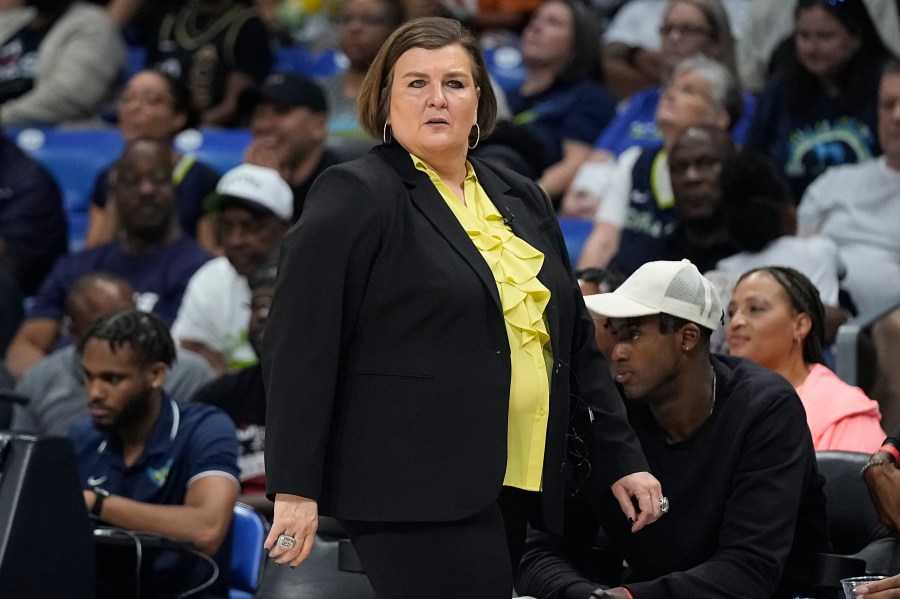 FILE - Dallas Wings head coach Latricia Trammell walks along the court during the second half of Game 3 of a WNBA basketball playoffs semifinal against the Las Vegas Aces, Sept. 29, 2023, in Arlington, Texas. (AP Photo/Sam Hodde, File)