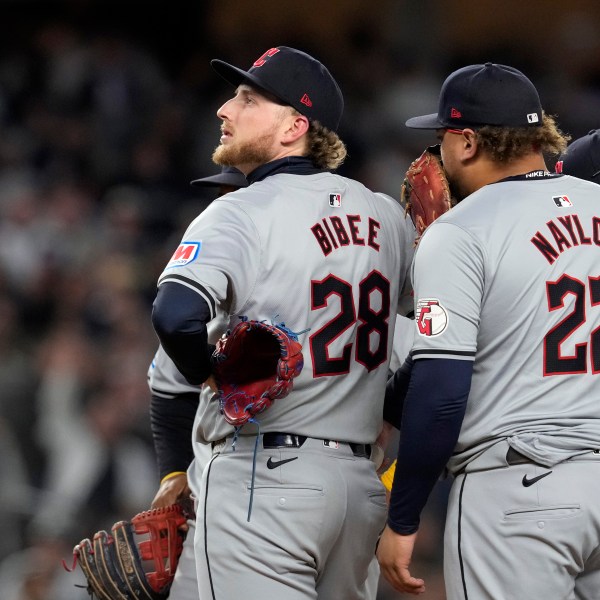 Cleveland Guardians starting pitcher Tanner Bibee (28) waits to be pulled from the game during the second inning in Game 2 of the baseball AL Championship Series against the New York Yankees Tuesday, Oct. 15, 2024, in New York. (AP Photo/Godofredo Vásquez)