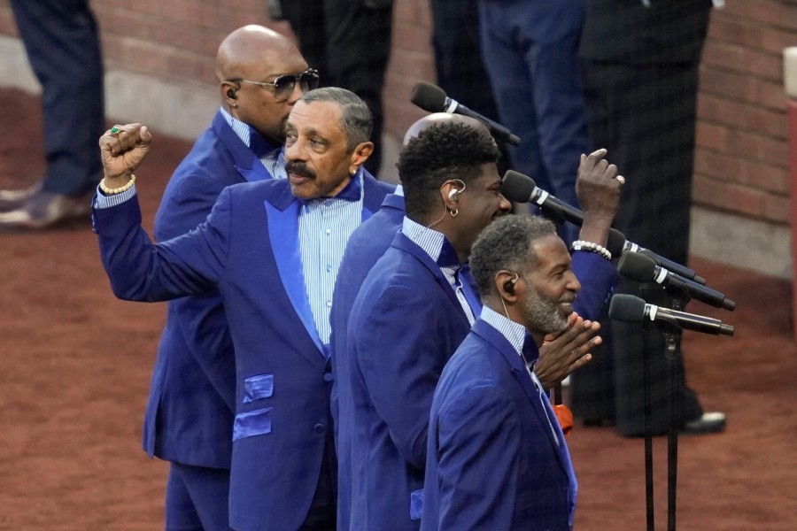 The Temptations perform before Game 5 of a baseball NL Championship Series between the Los Angeles Dodgers and the New York Mets, Friday, Oct. 18, 2024, in New York. (AP Photo/Ashley Landis)