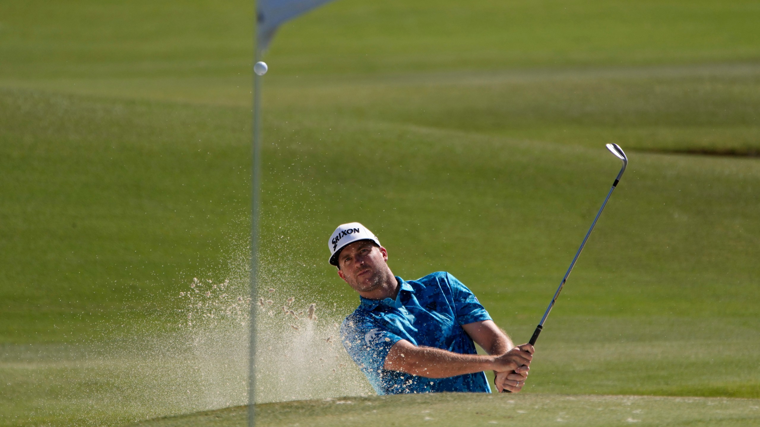 Taylor Pendrith hits out of a bunker on the 9th green during the first round of Shriners Children's Open golf tournament Thursday, Oct. 17, 2024, in Las Vegas. (AP Photo/John Locher)