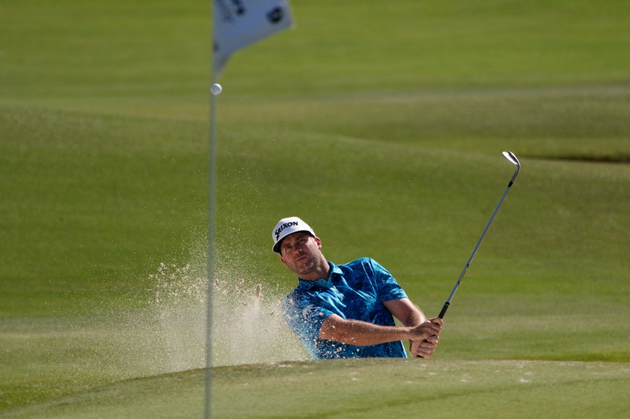 Taylor Pendrith hits out of a bunker on the 9th green during the first round of Shriners Children's Open golf tournament Thursday, Oct. 17, 2024, in Las Vegas. (AP Photo/John Locher)