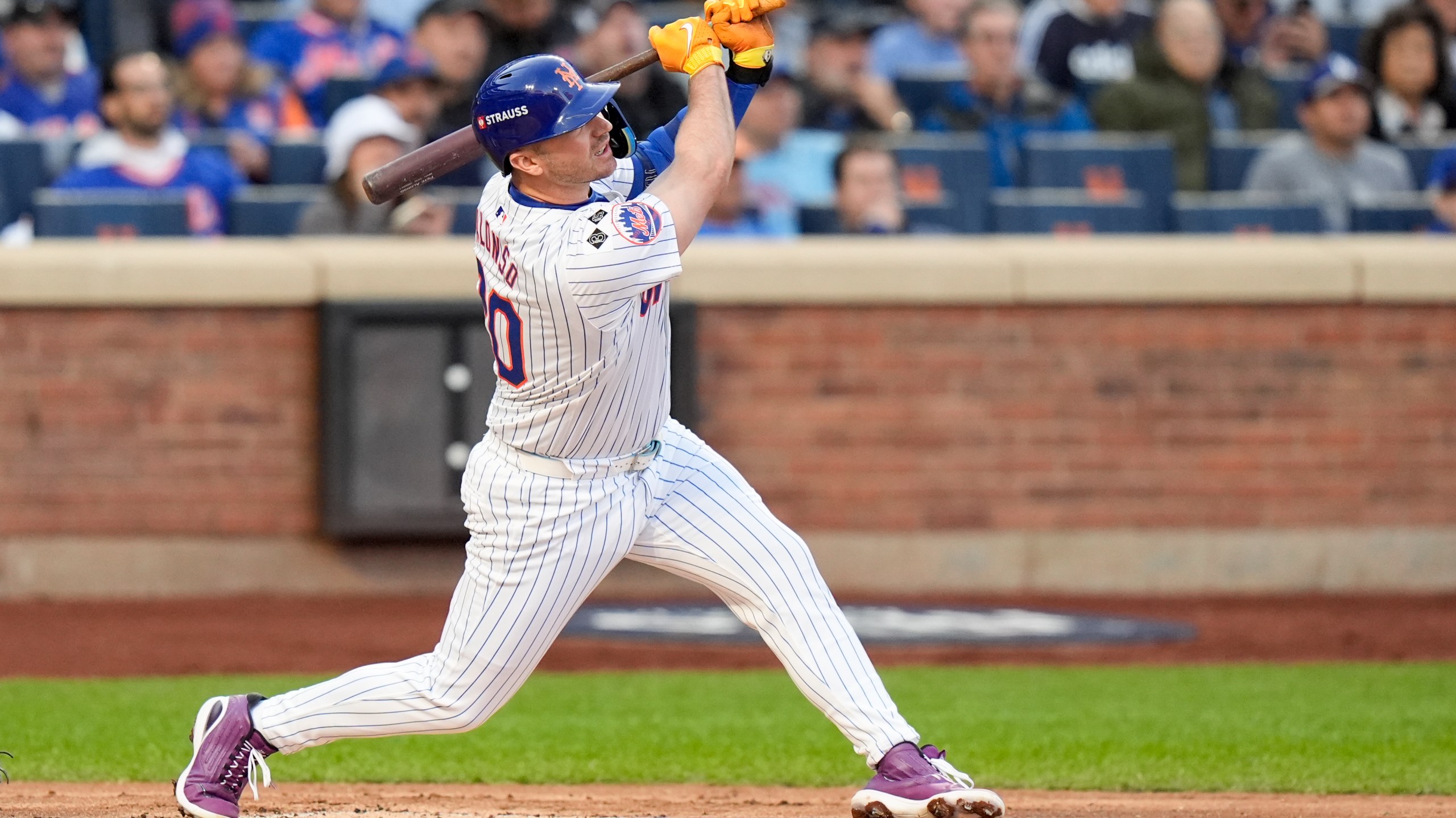 New York Mets' Pete Alonso hits a three-run home run against the Los Angeles Dodgers during the first inning in Game 5 of a baseball NL Championship Series, Friday, Oct. 18, 2024, in New York. (AP Photo/Frank Franklin II)