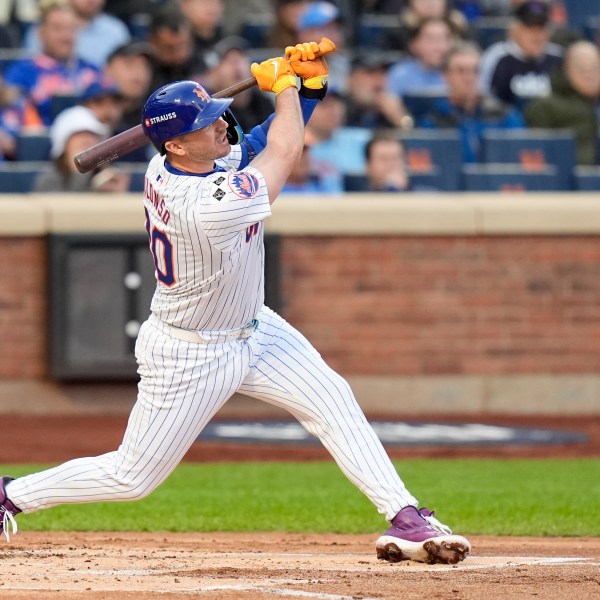 New York Mets' Pete Alonso hits a three-run home run against the Los Angeles Dodgers during the first inning in Game 5 of a baseball NL Championship Series, Friday, Oct. 18, 2024, in New York. (AP Photo/Frank Franklin II)