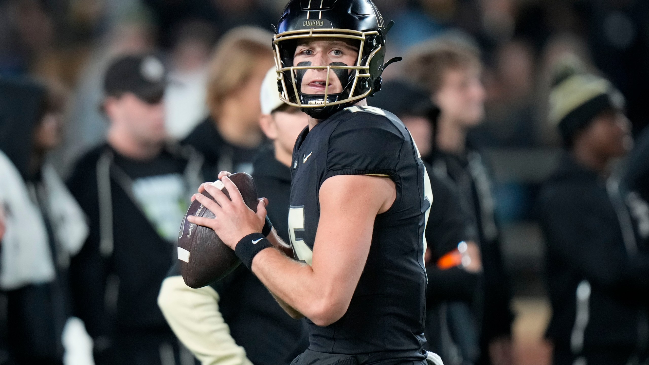 Purdue quarterback Ryan Browne looks to throw during warmups before playing Oregon in an NCAA college football game in West Lafayette, Ind., Friday, Oct. 18, 2024. (AP Photo/AJ Mast)