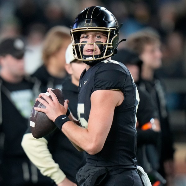 Purdue quarterback Ryan Browne looks to throw during warmups before playing Oregon in an NCAA college football game in West Lafayette, Ind., Friday, Oct. 18, 2024. (AP Photo/AJ Mast)