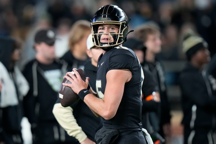 Purdue quarterback Ryan Browne looks to throw during warmups before playing Oregon in an NCAA college football game in West Lafayette, Ind., Friday, Oct. 18, 2024. (AP Photo/AJ Mast)