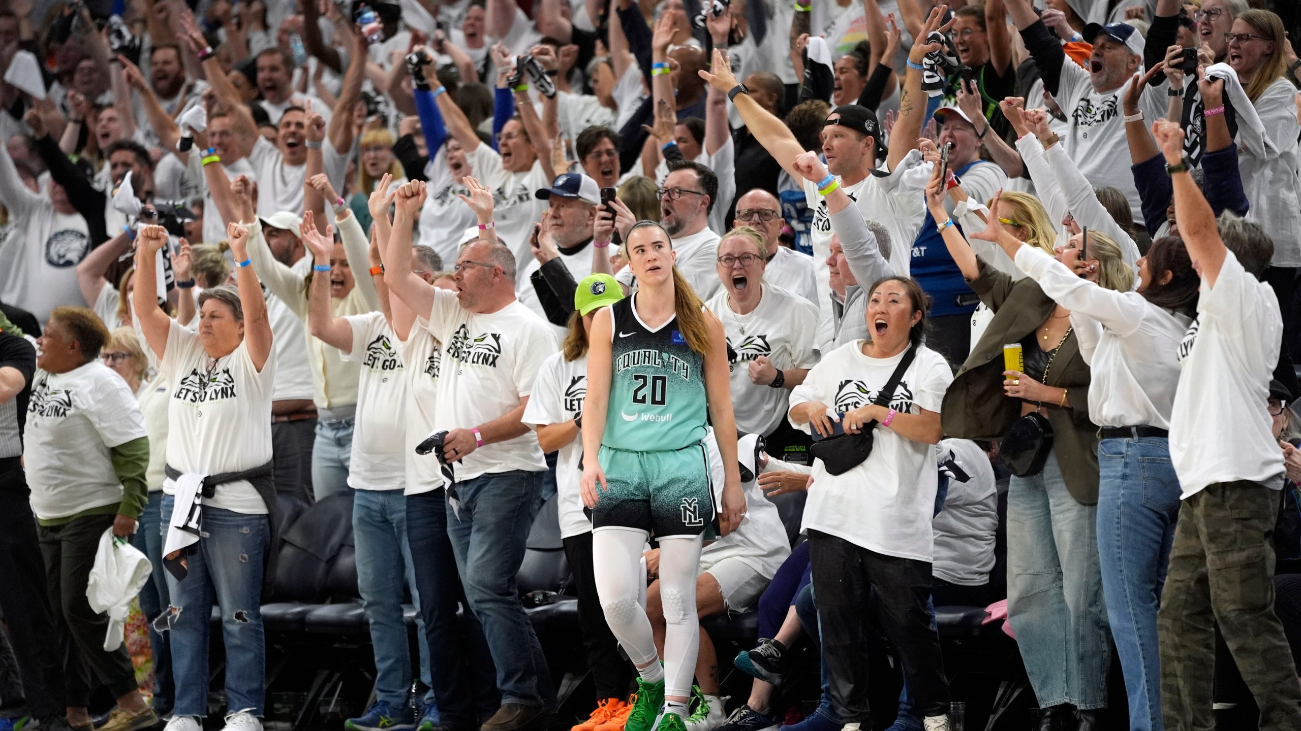 New York Liberty guard Sabrina Ionescu (20) reacts after missing a shot at the buzzer during the second half of Game 4 of a WNBA basketball final playoff series, Friday, Oct. 18, 2024, in Minneapolis. The Lynx won 82-80, forcing a Game 5 in the series. (AP Photo/Abbie Parr)