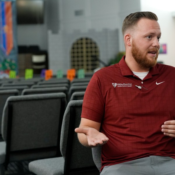 Trevor Cowling talks about his family, the economy and the election during an interview at Valley Baptist Church, Tuesday, June 18, 2024, in Mesa, Ariz. (AP Photo/Ross D. Franklin)