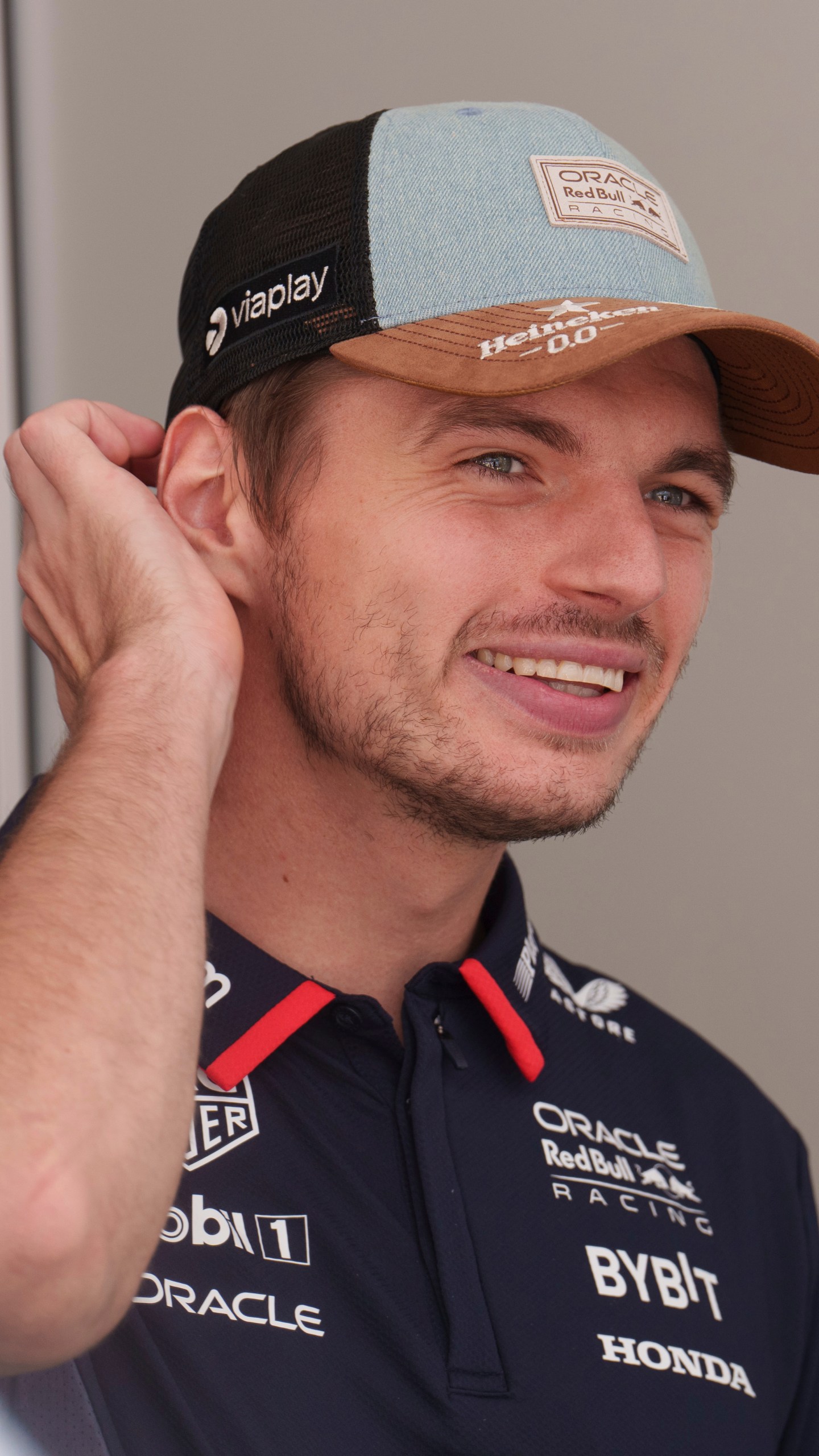 Red Bull driver Max Verstappen, of the Netherlands, talks with fans at the Formula One U.S. Grand Prix auto race at Circuit of the Americas, Saturday, Oct. 19, 2024, in Austin, Texas. (AP Photo/Nick Didlick)