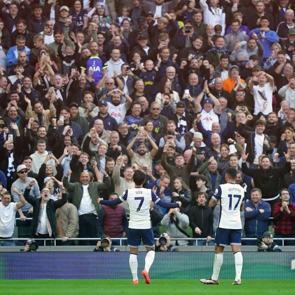 Tottenham Hotspur's Son Heung-Min, left, celebrates scoring with fans during the English Premier League soccer match between Tottenham Hotspur and West Ham United at the Tottenham Hotspur Stadium, London, Saturday Oct. 19, 2024. (Zac Goodwin/PA via AP)