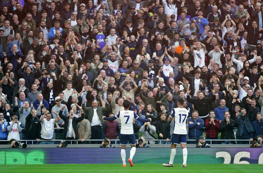 Tottenham Hotspur's Son Heung-Min, left, celebrates scoring with fans during the English Premier League soccer match between Tottenham Hotspur and West Ham United at the Tottenham Hotspur Stadium, London, Saturday Oct. 19, 2024. (Zac Goodwin/PA via AP)