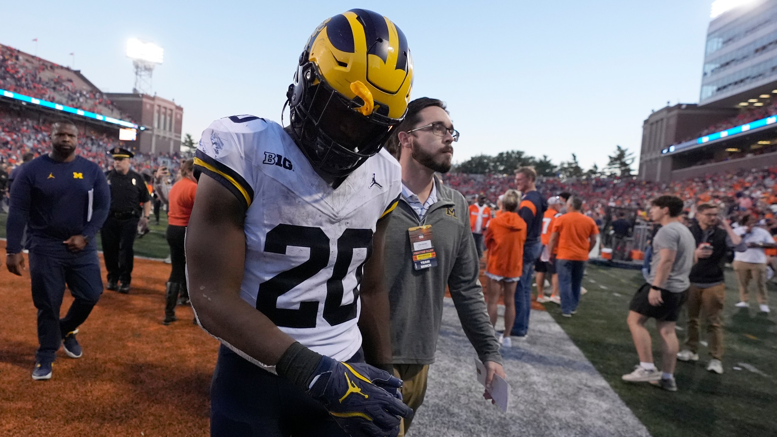 Michigan running back Kalel Mullings walks off the field after the team's 21-7 loss to Illinois in an NCAA college football game Saturday, Oct. 19, 2024, in Champaign, Ill. (AP Photo/Charles Rex Arbogast)