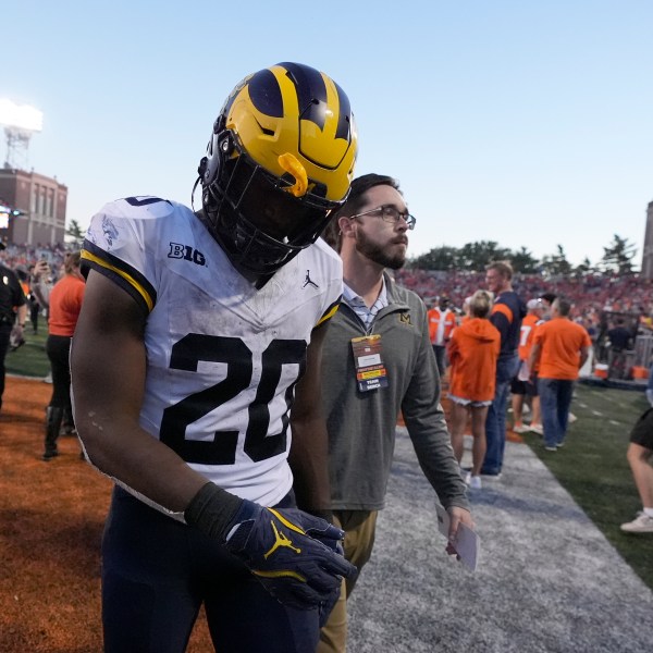 Michigan running back Kalel Mullings walks off the field after the team's 21-7 loss to Illinois in an NCAA college football game Saturday, Oct. 19, 2024, in Champaign, Ill. (AP Photo/Charles Rex Arbogast)