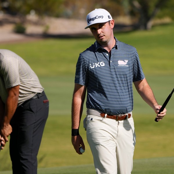 J.T. Poston reacts after sinking a putt on the third green during the first round of Shriners Children's Open golf tournament Thursday, Oct. 17, 2024, in Las Vegas. (AP Photo/John Locher)