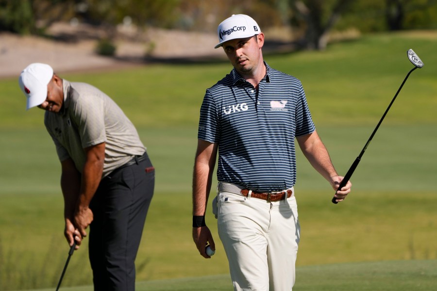 J.T. Poston reacts after sinking a putt on the third green during the first round of Shriners Children's Open golf tournament Thursday, Oct. 17, 2024, in Las Vegas. (AP Photo/John Locher)