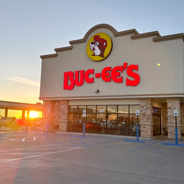 FILE - The sun rises beyond the gasoline pumps outside a Buc-ee's store on April 4, 2024, in Johnstown, Colo. (AP Photo/David Zalubowski, File)