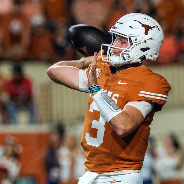 Texas quarterback Quinn Ewers (3) throws down field against Georgia during the first half of an NCAA college football game in Austin, Texas, Saturday, Oct. 19, 2024. (AP Photo/Rodolfo Gonzalez)