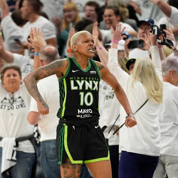 Minnesota Lynx guard Courtney Williams (10) reacts after defeating the New York Liberty after Game 4 of a WNBA basketball final playoff series, Friday, Oct. 18, 2024, in Minneapolis. The Lynx won 82-80, forcing a Game 5 in the series. (AP Photo/Abbie Parr)