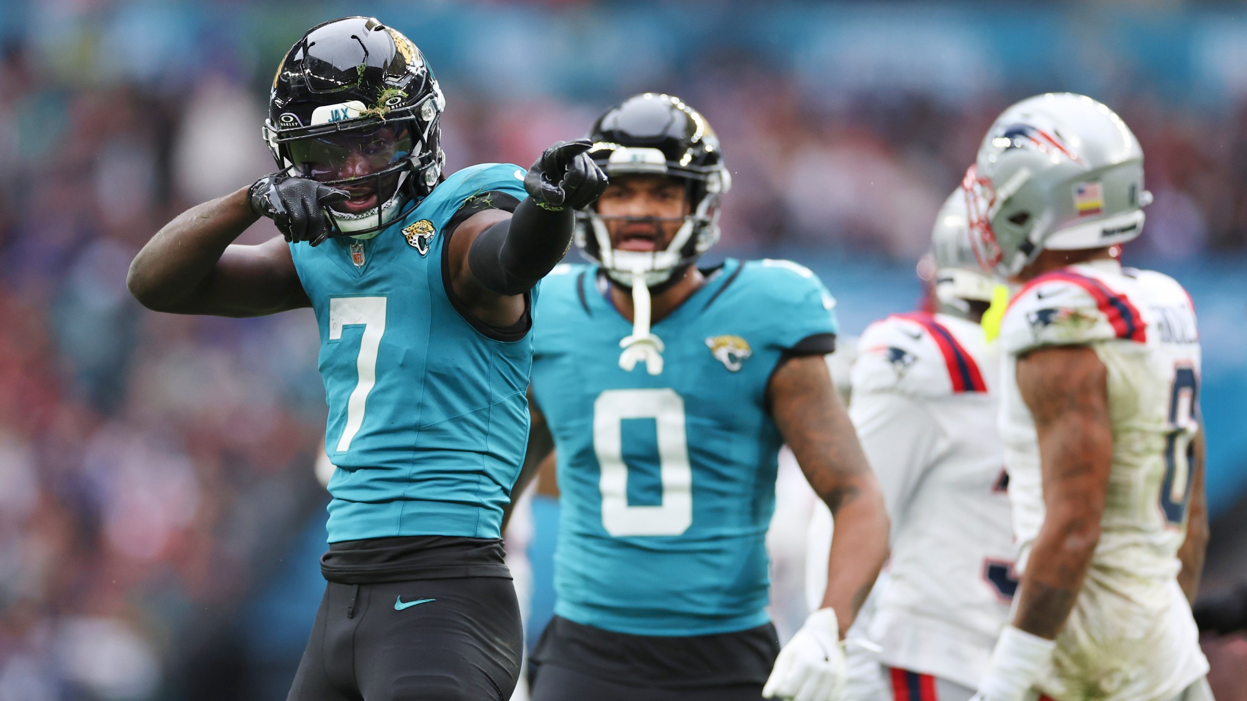 Jacksonville Jaguars wide receiver Brian Thomas Jr. (7) reacts after his pass reception for a first down during the first half of an NFL football game against the New England Patriots, Sunday, Oct. 20, 2024, in London. (AP Photo/Ian Walton)