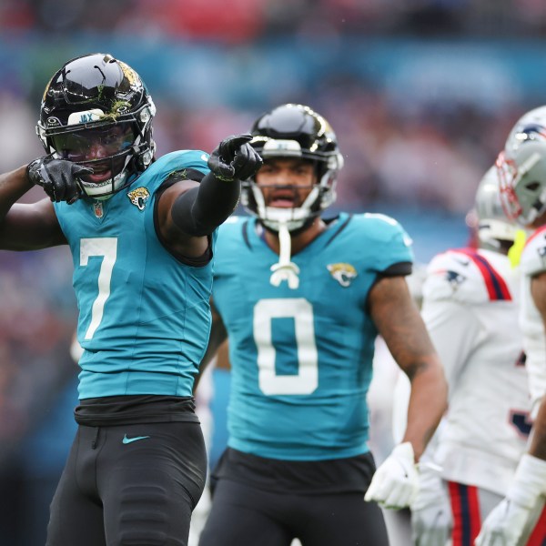 Jacksonville Jaguars wide receiver Brian Thomas Jr. (7) reacts after his pass reception for a first down during the first half of an NFL football game against the New England Patriots, Sunday, Oct. 20, 2024, in London. (AP Photo/Ian Walton)