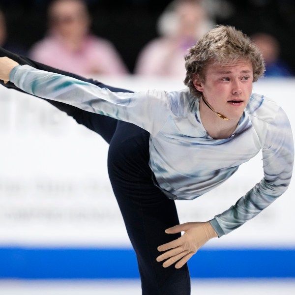 Ilia Malinin of the United States competes during the men's short program at the Skate America figure skating event in Allen, Texas, Saturday, Oct. 19, 2024. (AP Photo/Tony Gutierrez)