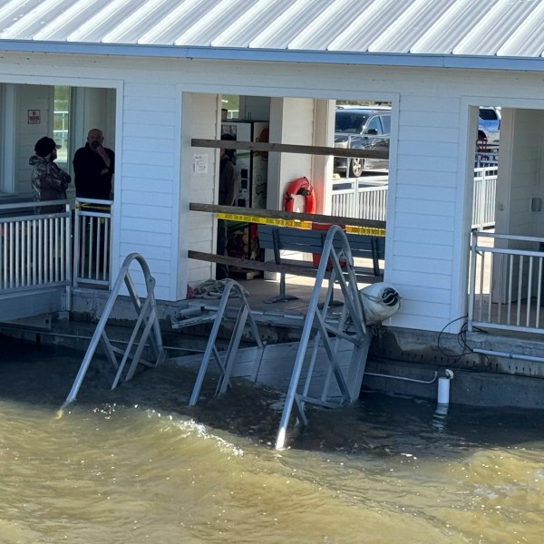 A portion of the gangway which collapsed Saturday afternoon remains visible on Sapelo Island in McIntosh county, Ga., Sunday, Oct. 20, 2024. (AP Photo/Lewis Levine)