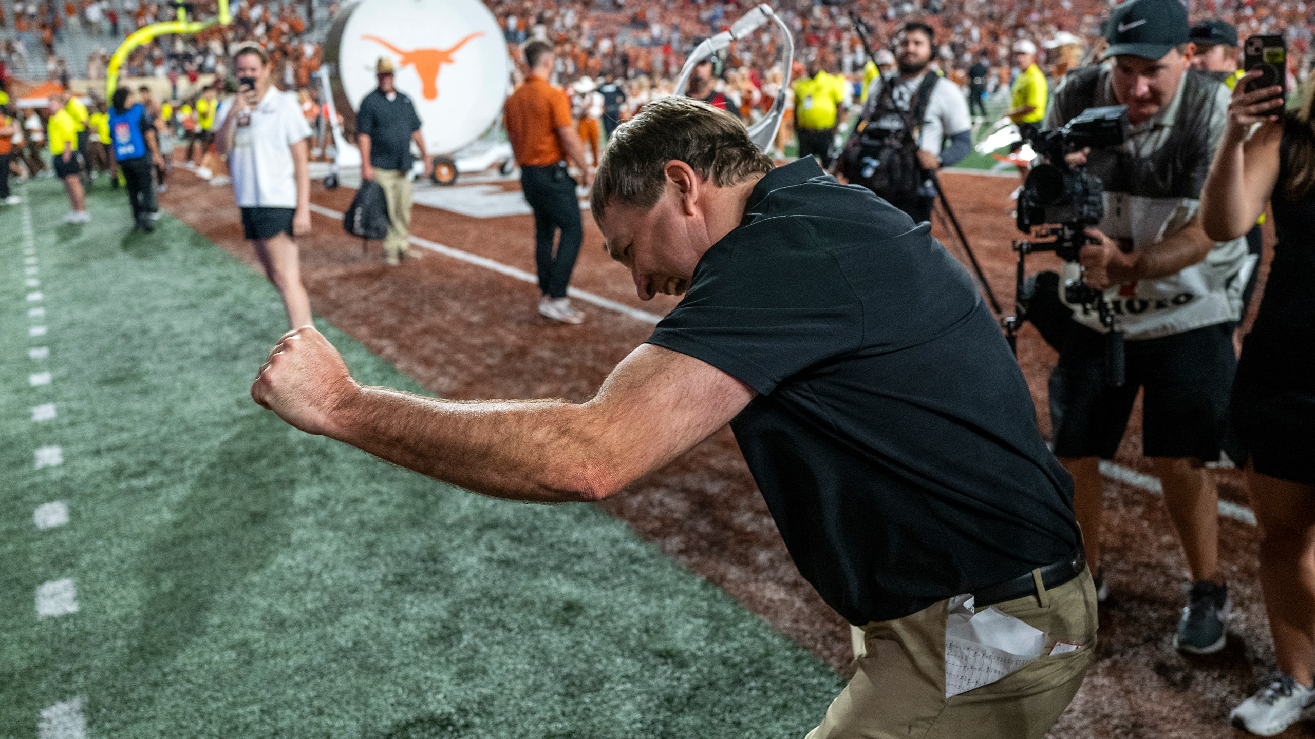 Georgia head coach Kirby Smart celebrates with Georgia fans cheering from the stands after defeating Texas during an NCAA college football game in Austin, Texas, Saturday, Oct. 19, 2024. (AP Photo/Rodolfo Gonzalez)