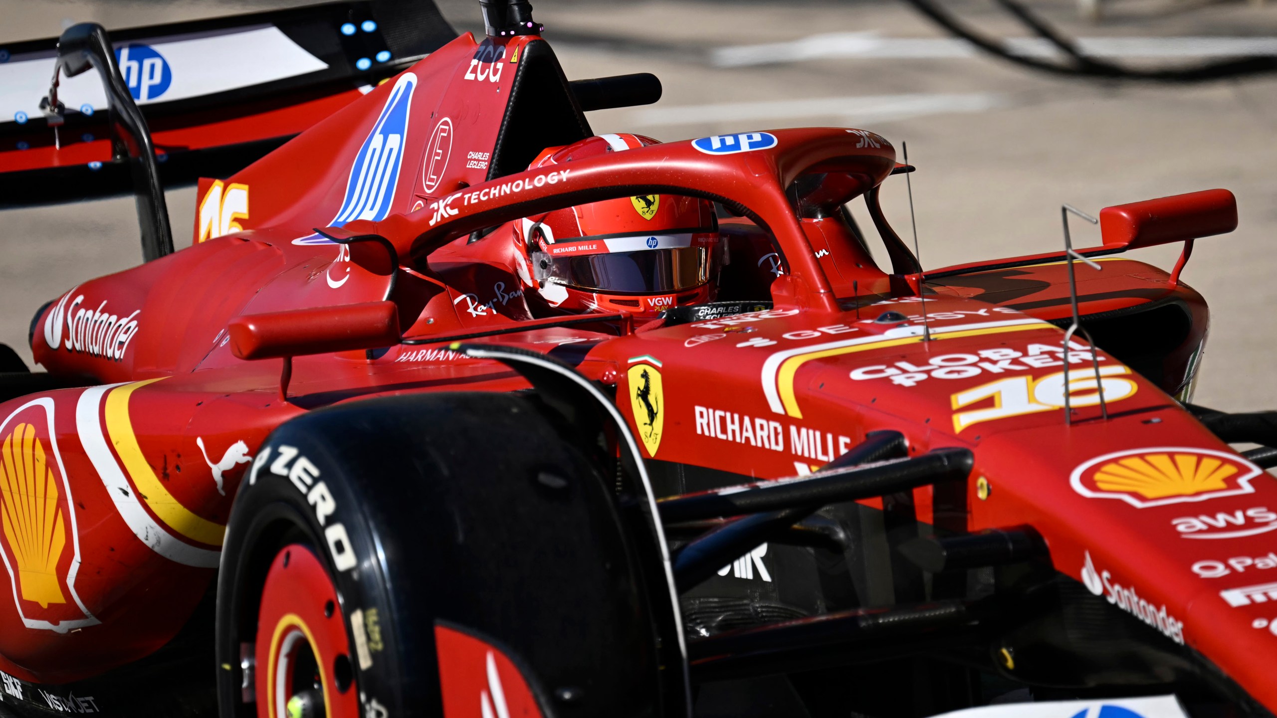 Ferrari driver Charles Leclerc, of Monaco, exits pit row during the F1 U.S. Grand Prix auto race at the Circuit of the Americas, Sunday, Oct. 20, 2024, in Austin, Texas. (Patrick Fallon/Pool Photo via AP)