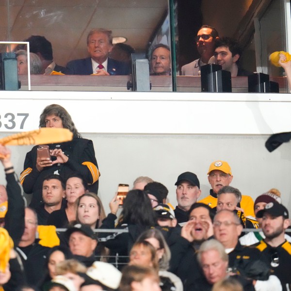 Republican presidential nominee former President Donald Trump watches the first half of an NFL football game between the Pittsburgh Steelers and the New York Jets in Pittsburgh, Sunday, Oct. 20, 2024. (AP Photo/Gene J. Puskar)