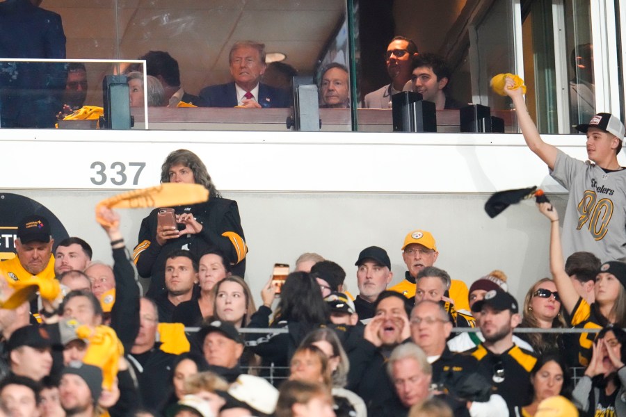 Republican presidential nominee former President Donald Trump watches the first half of an NFL football game between the Pittsburgh Steelers and the New York Jets in Pittsburgh, Sunday, Oct. 20, 2024. (AP Photo/Gene J. Puskar)