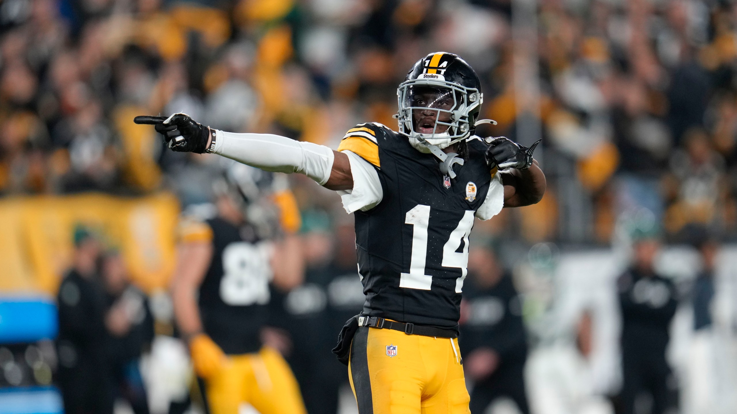 Pittsburgh Steelers wide receiver George Pickens (14) celebrates a first down catch in the second half of an NFL football game against the New York Jets in Pittsburgh, Sunday, Oct. 20, 2024. (AP Photo/Gene J. Puskar)