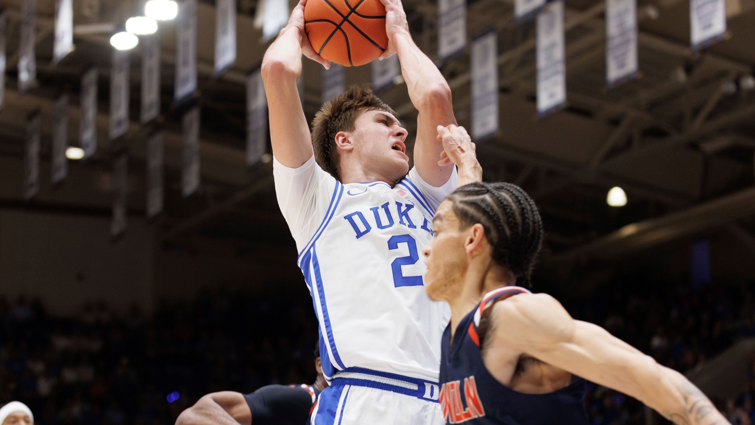 Duke's Cooper Flagg (2) drives during the first half of an exhibition NCAA college basketball game against Lincoln in Durham, N.C., Saturday, Oct. 19, 2024. (AP Photo/Ben McKeown)